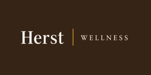 Herst Wellness logo on a brown background with white and yellow text.