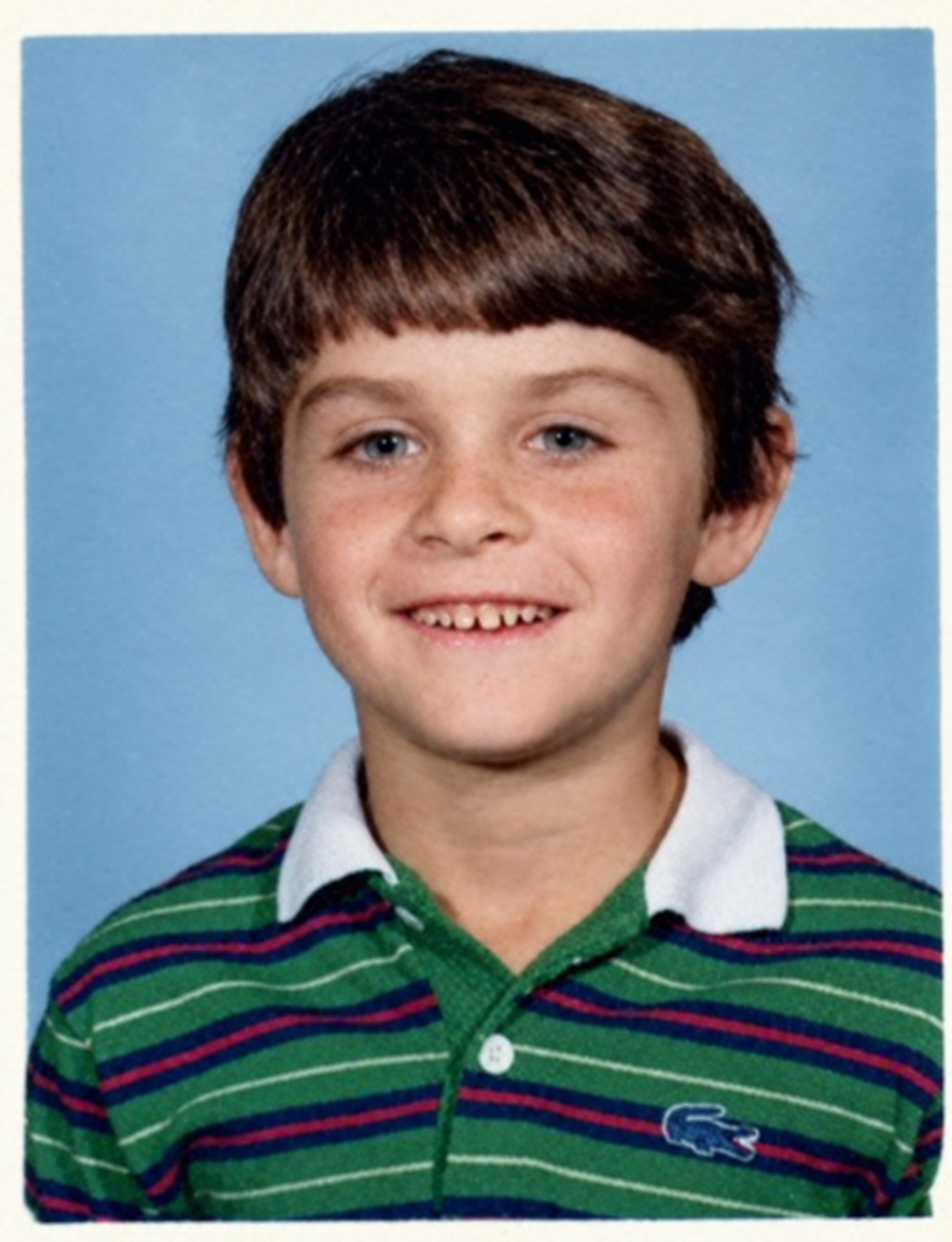 Chad in his 1980 Ross School portrait, wearing a green striped shirt.