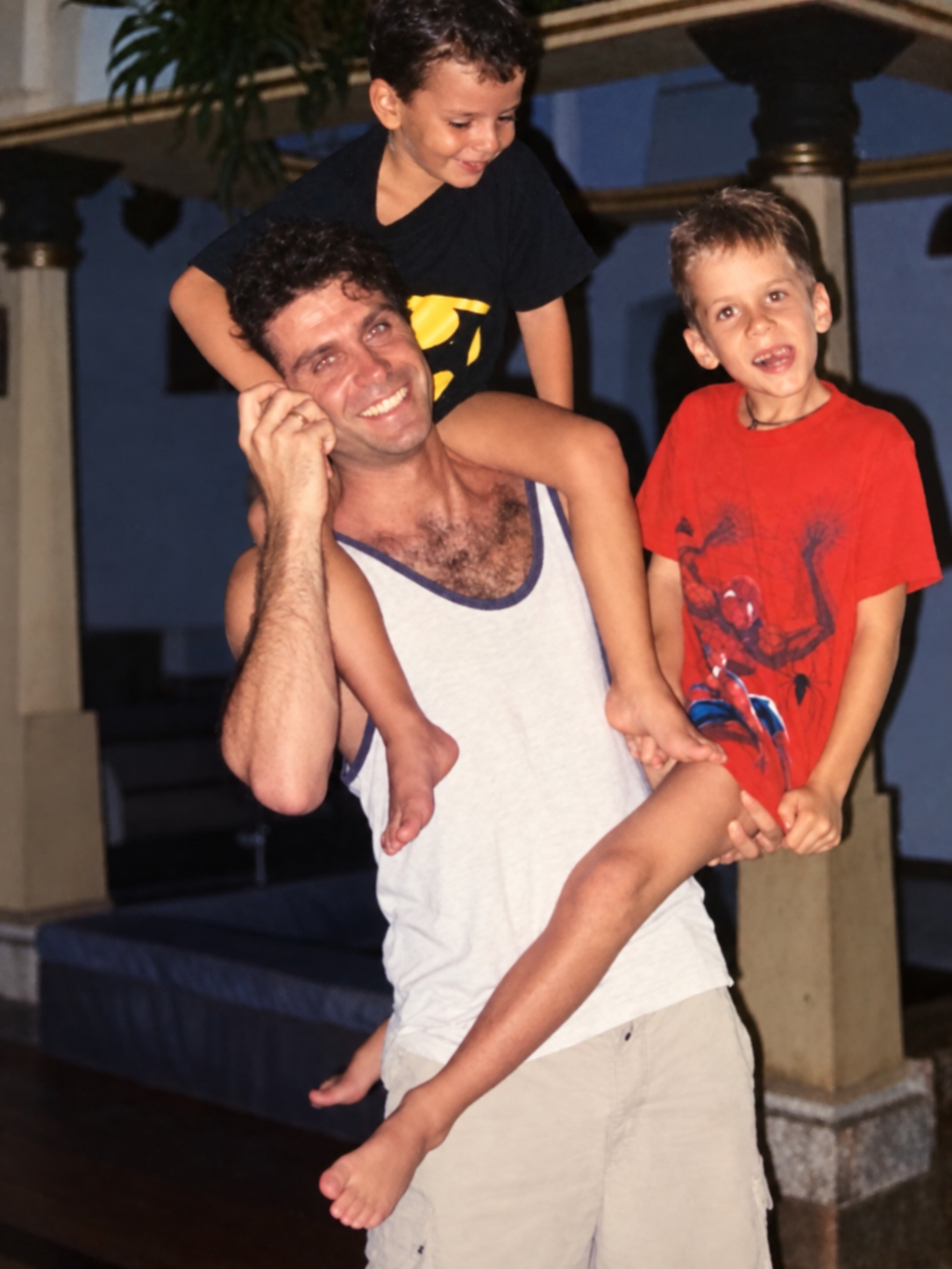 Chad smiling with Sanjay and Satya in a candid photo from around 2004.