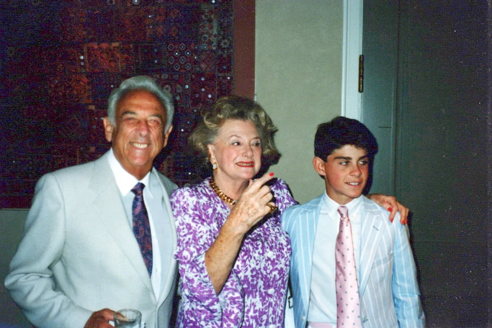 Chad with Nana and Grandpa at his grammar-school graduation.